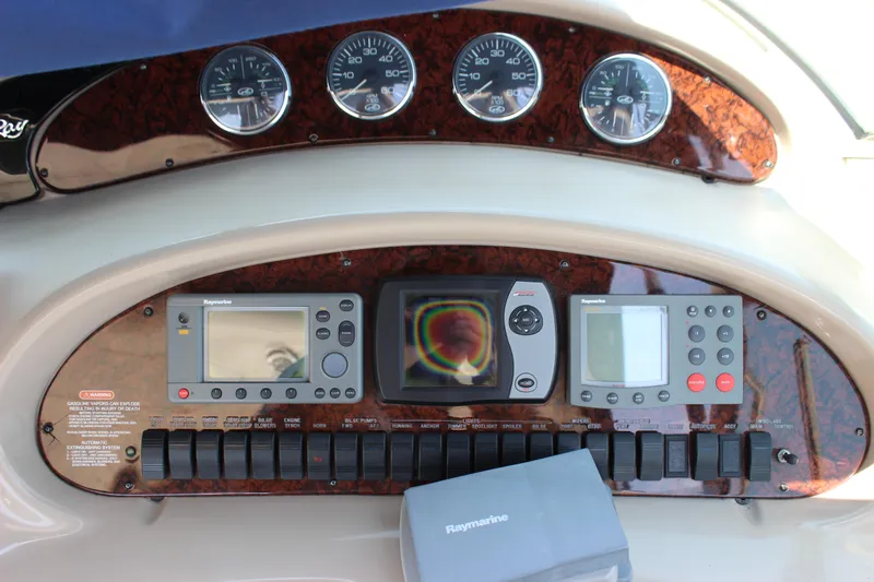  Yacht Photos Pics Control panel of a 2003 Sea Ray 380 Sundancer boat with navigation instruments.