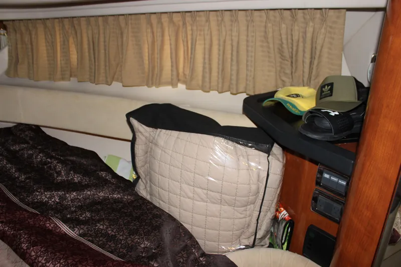  Yacht Photos Pics Interior cabin of 2003 Sea Ray 380 Sundancer with bedding and accessories.