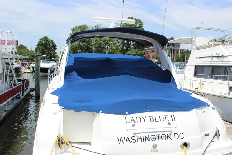  Yacht Photos Pics 2003 Sea Ray 380 Sundancer docked, covered in blue tarp, named "Lady Blue II".