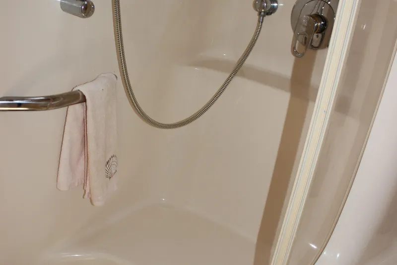  Yacht Photos Pics Shower area in 2003 Sea Ray 380 Sundancer yacht with towel and grab bar.