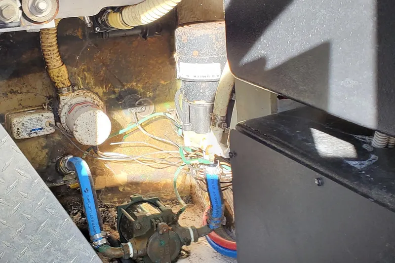  Yacht Photos Pics Engine compartment of a 2003 Sea Ray 380 Sundancer with visible wiring and components.