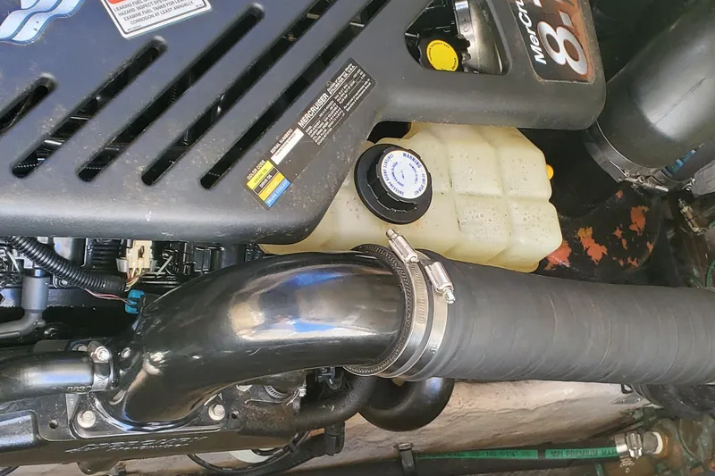  Yacht Photos Pics Engine compartment of 2003 Sea Ray 380 Sundancer with visible components and hoses.