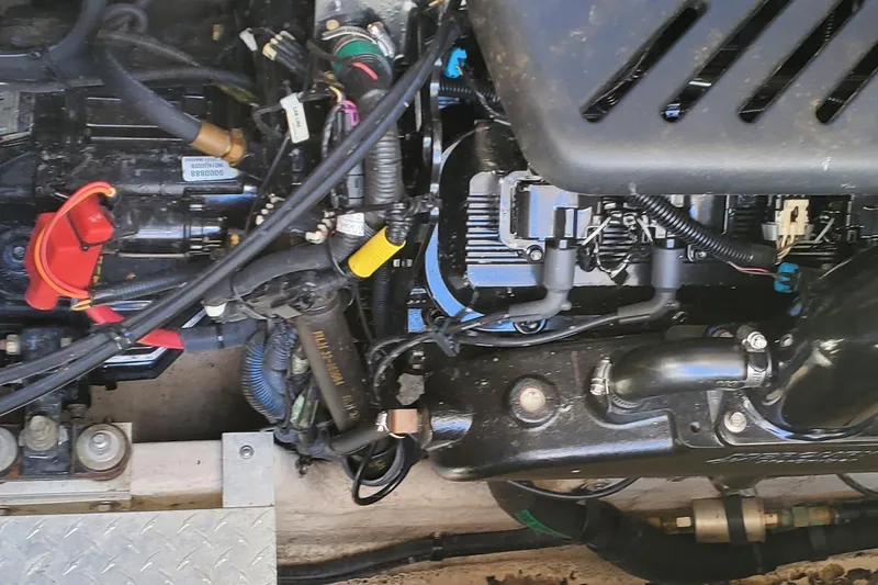  Yacht Photos Pics Engine compartment of a 2003 Sea Ray 380 Sundancer boat, showing detailed components.