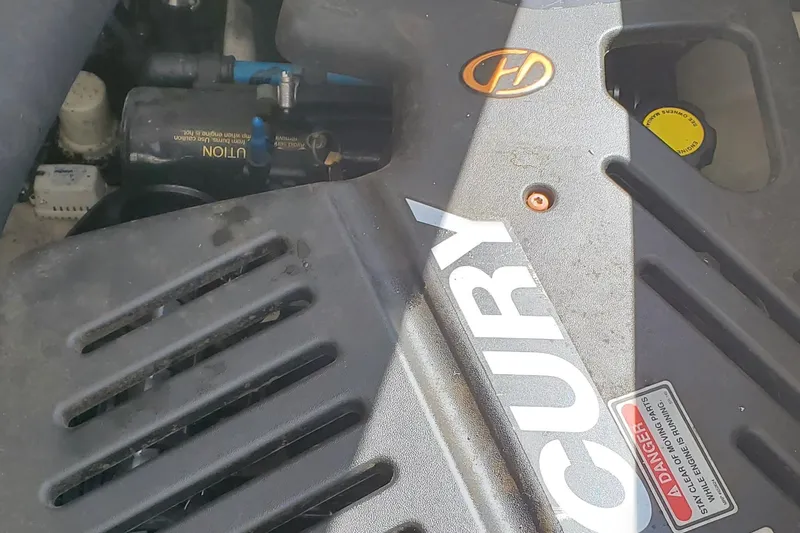  Yacht Photos Pics Engine compartment of a 2003 Sea Ray 380 Sundancer boat, featuring Mercury components.