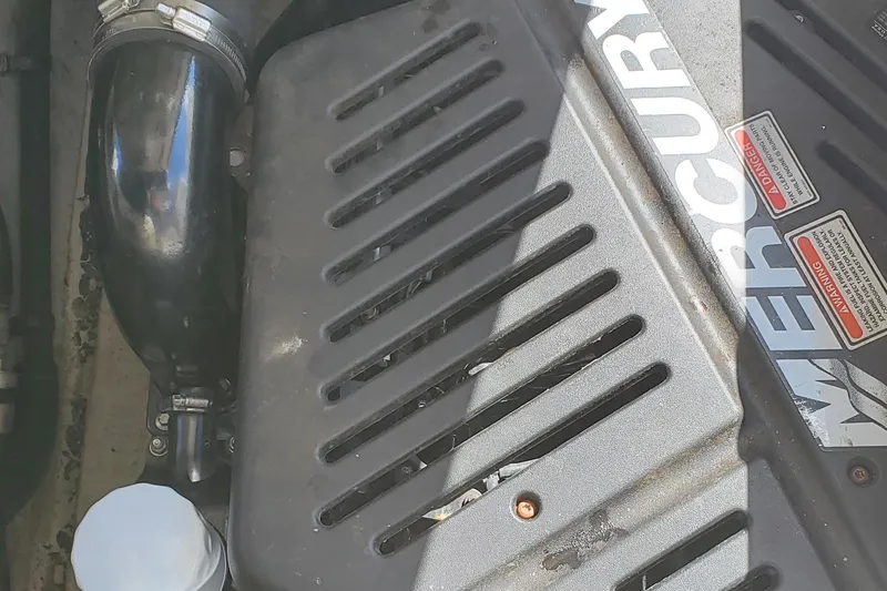  Yacht Photos Pics Engine compartment of a 2003 Sea Ray 380 Sundancer with Mercury components visible.