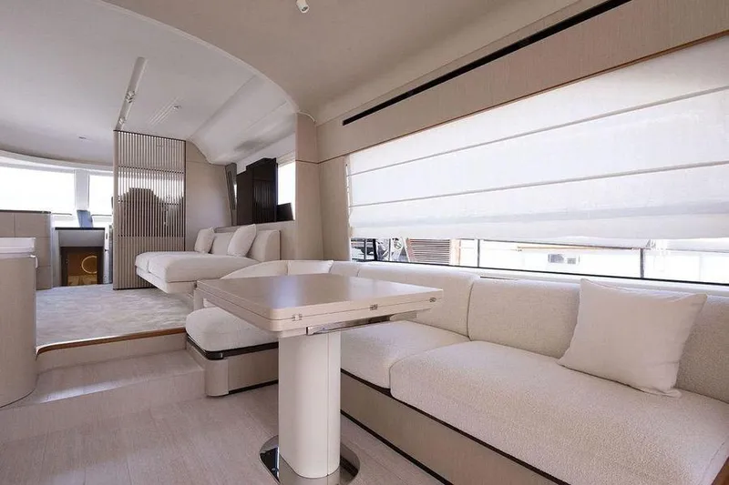  Yacht Photos Pics Luxurious interior of 2022 Azimut Fly 68 yacht with modern seating and dining area.