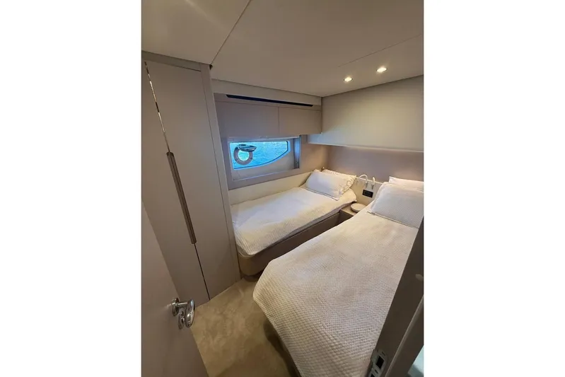  Yacht Photos Pics Interior of 2022 Azimut Fly 68 yacht with twin beds and modern design.