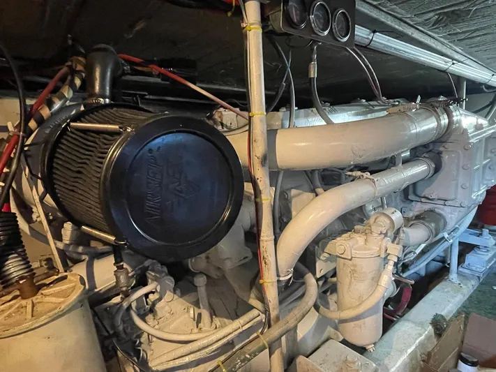 Occtane Yacht Photos Pics Engine room of a 1990 Ocean Yachts 44 Super Sport, showcasing mechanical components.