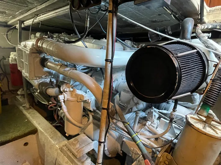 Occtane Yacht Photos Pics Engine room of a 1990 Ocean Yachts 44 Super Sport, showcasing detailed machinery components.