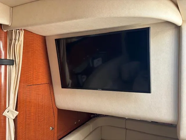  Yacht Photos Pics Flat-screen TV in 2003 Sea Ray 340 Sundancer cabin interior.