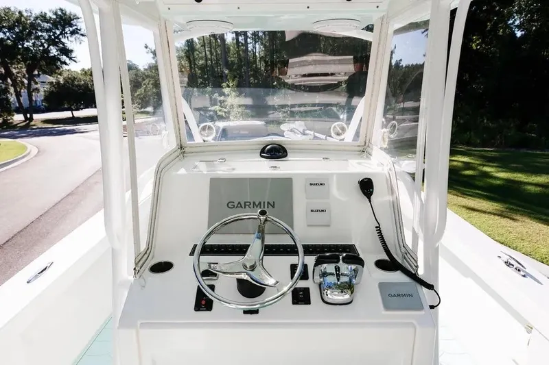  Yacht Photos Pics 2017 Albury Brothers center console boat with Garmin navigation and Suzuki controls.