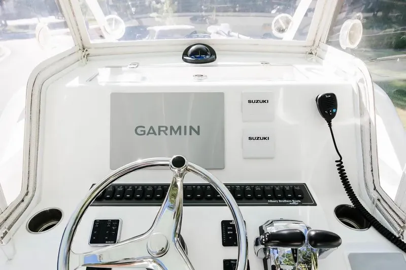  Yacht Photos Pics 2017 Albury Brothers center console boat dashboard with Garmin and Suzuki controls.
