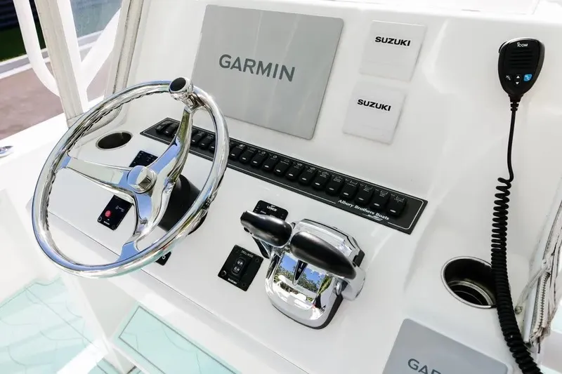  Yacht Photos Pics 2017 Albury Brothers center console boat dashboard with Garmin and Suzuki controls.