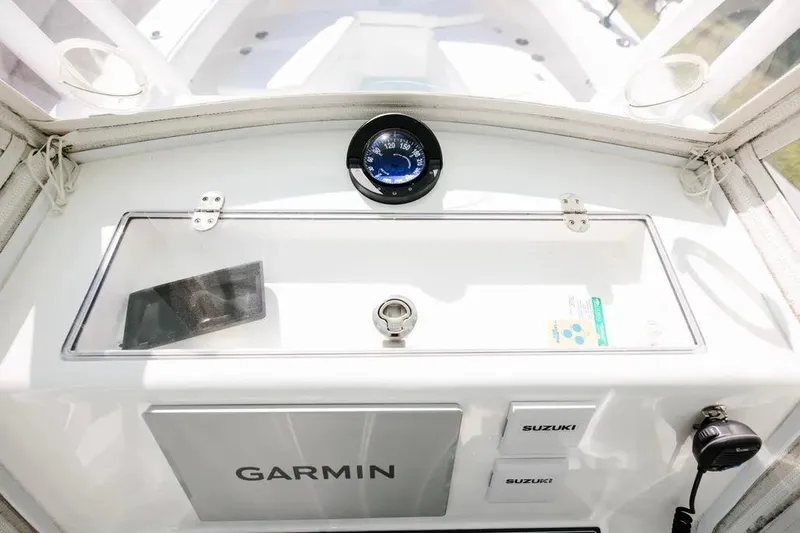  Yacht Photos Pics 2017 Albury Brothers center console with Garmin navigation and Suzuki controls.