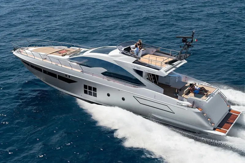  Yacht Photos Pics Luxury 2015 Azimut 77S yacht cruising on open sea, showcasing sleek design and elegance.