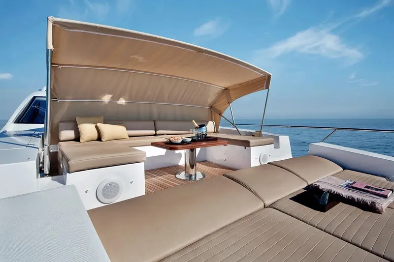  Yacht Photos Pics Luxurious 2015 Azimut 77S yacht deck with elegant seating and ocean view.