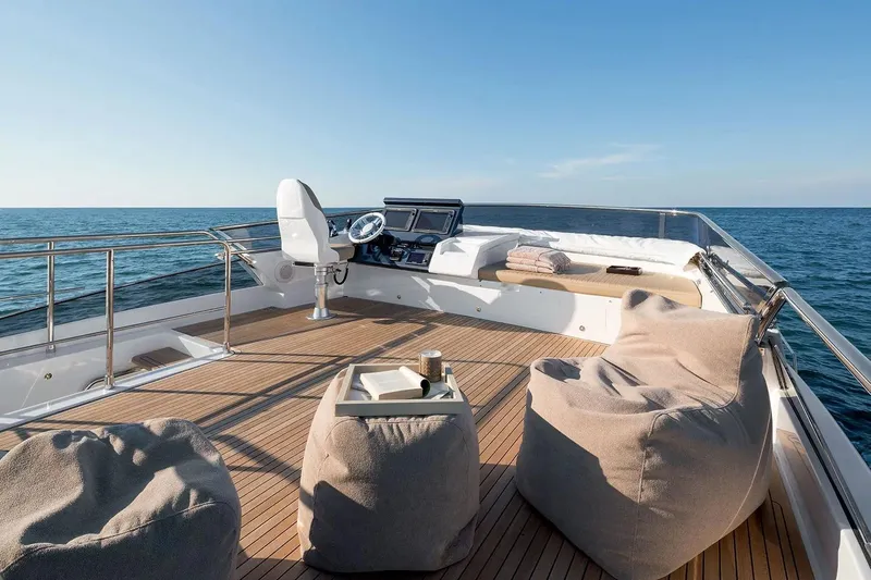  Yacht Photos Pics Luxurious 2015 Azimut 77S yacht deck with seating, ocean view, and clear sky.