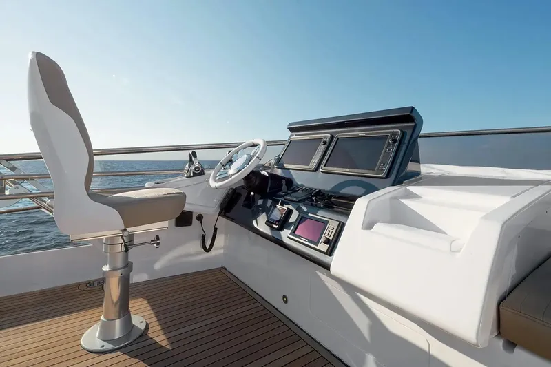  Yacht Photos Pics Helm station of 2015 Azimut 77S yacht with modern navigation equipment.