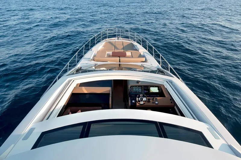  Yacht Photos Pics Azimut 77S 2015 yacht cruising on open sea, showcasing luxurious deck and helm.
