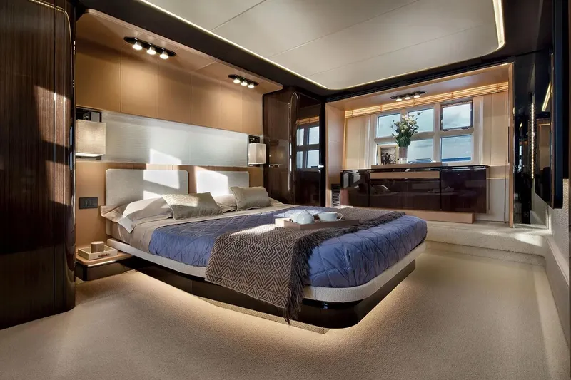  Yacht Photos Pics Luxurious bedroom interior of 2015 Azimut 77S yacht with modern design and elegant furnishings.