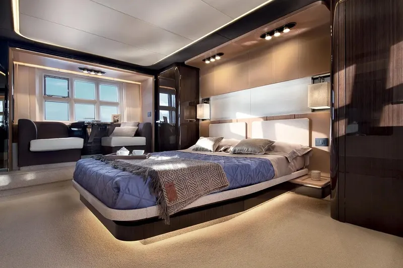  Yacht Photos Pics Luxurious bedroom interior of 2015 Azimut 77S yacht with modern design and ambient lighting.