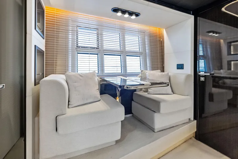 Panda Yacht Photos Pics Luxurious interior seating area on a 2017 Azimut 77S yacht with modern design.