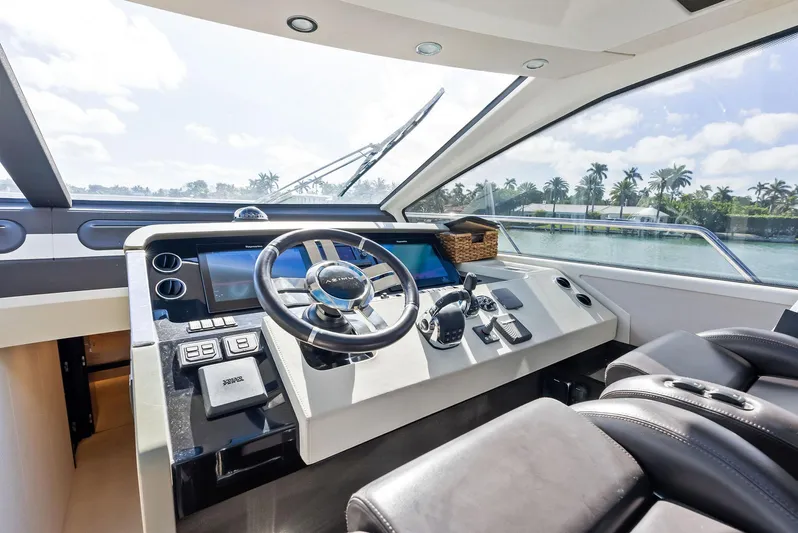 Panda Yacht Photos Pics Luxurious 2017 Azimut 77S yacht helm with modern controls and panoramic view.