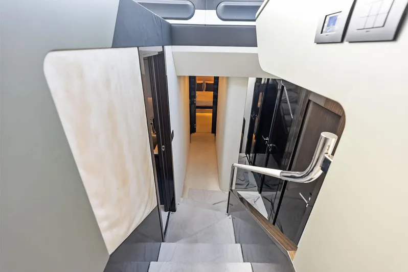 Panda Yacht Photos Pics Interior staircase of 2017 Azimut 77S yacht, featuring modern design and sleek finishes.