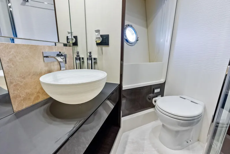 Panda Yacht Photos Pics Luxury bathroom in 2017 Azimut 77S yacht with modern sink and toilet.