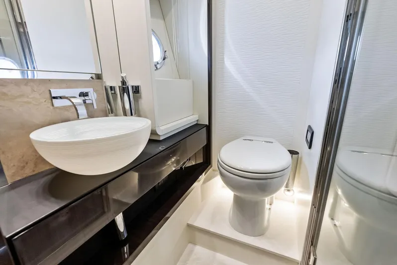 Panda Yacht Photos Pics Luxurious bathroom in 2017 Azimut 77S yacht with modern fixtures and elegant design.