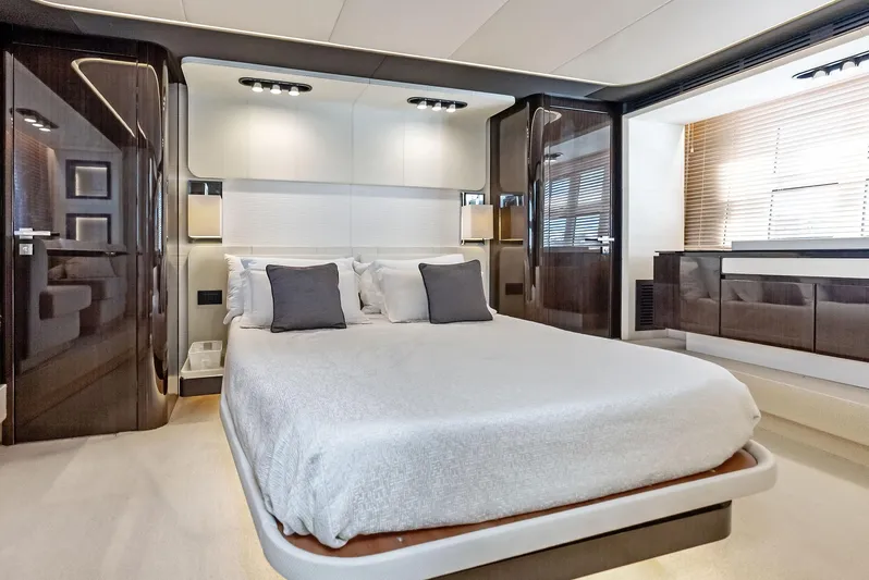 Panda Yacht Photos Pics Luxurious bedroom interior of 2017 Azimut 77S yacht with modern design and elegant furnishings.