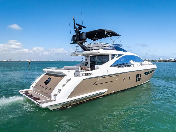 Panda Yacht Photos Pics Azimut 77S 2017 yacht cruising on clear blue waters under a sunny sky.