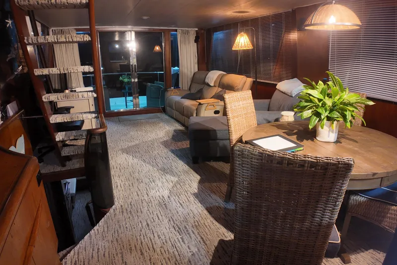  Yacht Photos Pics Luxurious 1987 Viking Gulfstar yacht interior with cozy seating, dining area, and elegant decor.