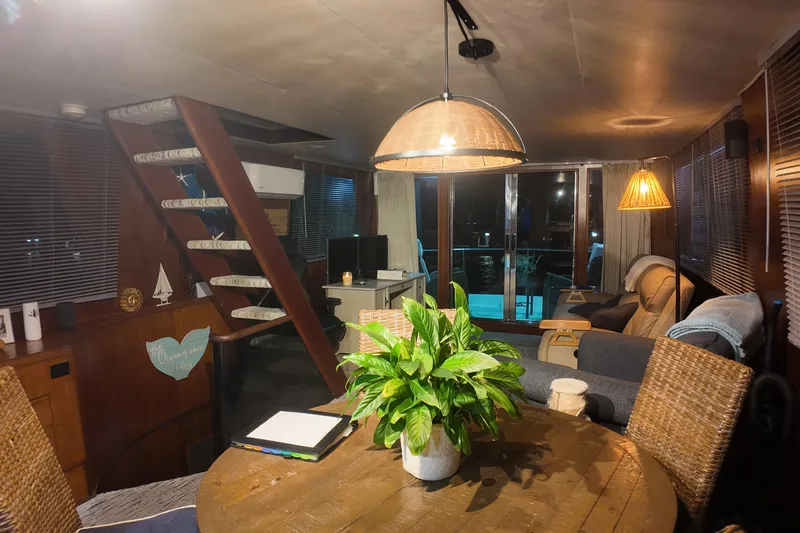  Yacht Photos Pics Cozy interior of 1987 Viking Gulfstar yacht with wooden decor and modern furnishings.