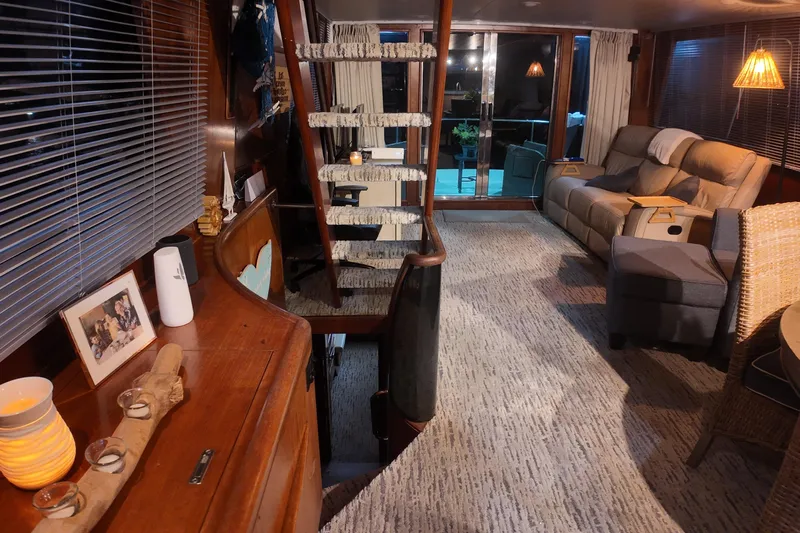  Yacht Photos Pics Luxurious interior of a 1987 Viking Gulfstar yacht with cozy seating and elegant decor.