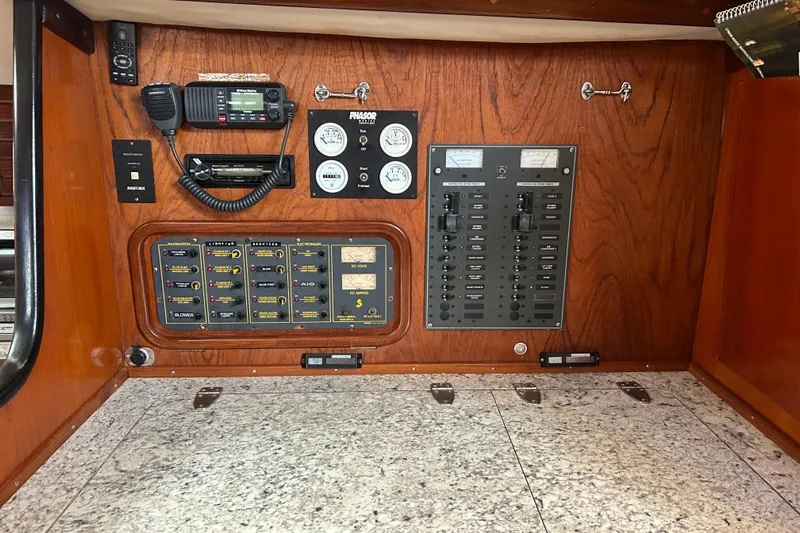 Zephyrus Yacht Photos Pics Control panel of a 1991 Beneteau 500 Oceanis yacht with navigation and communication equipment.