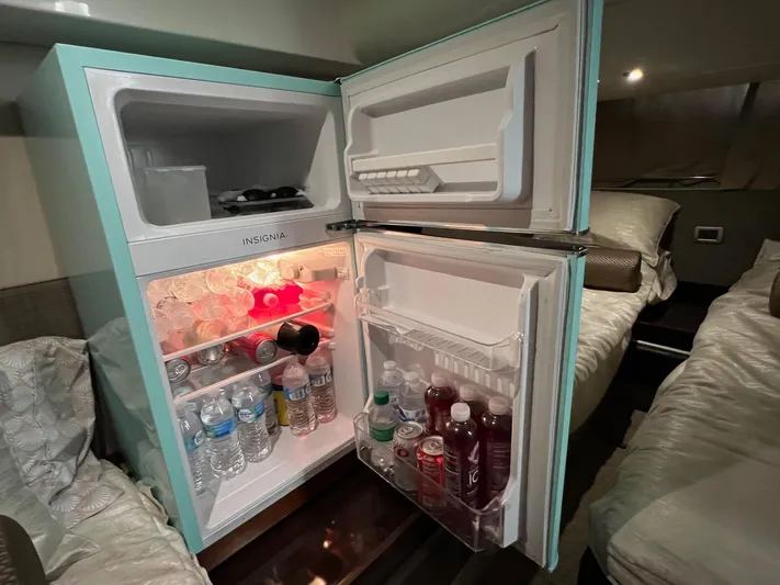  Yacht Photos Pics Fridge in Sea Ray Sundancer 400 yacht, stocked with beverages.
