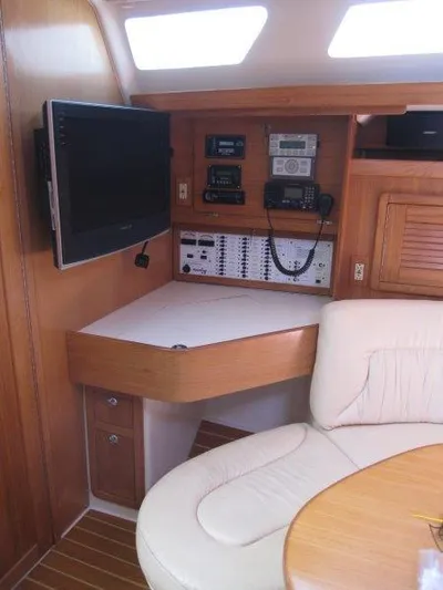  Yacht Photos Pics 2007 Catalina MkII yacht interior with navigation equipment and seating area.