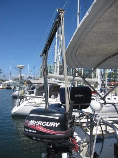  Yacht Photos Pics 2007 Catalina MkII sailboat with Mercury outboard motor docked in marina.