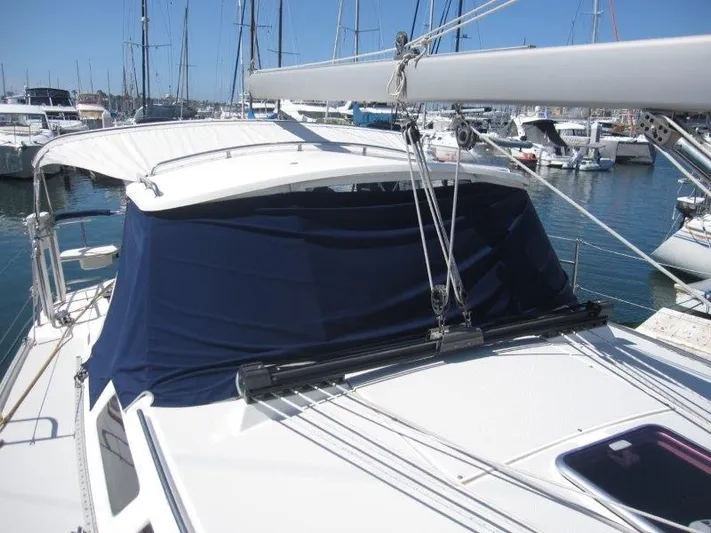 Yacht Photos Pics 2007 Catalina MkII sailboat docked at marina with blue canvas cover.
