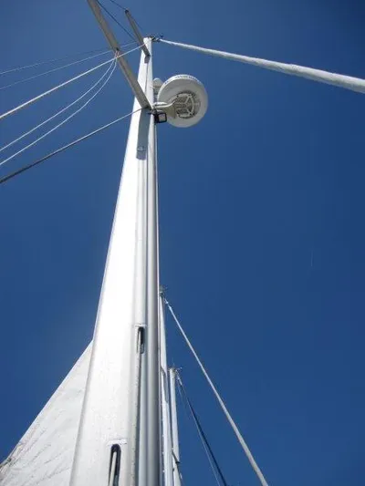  Yacht Photos Pics Mast of 2007 Catalina MkII sailboat against clear blue sky.