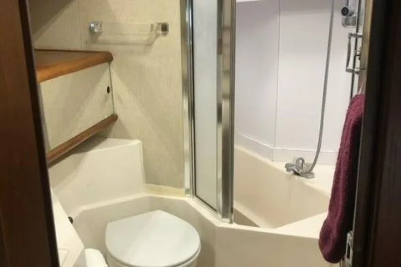  Yacht Photos Pics Bathroom interior of 1985 Bayliner 4550 Motoryacht with shower and toilet.