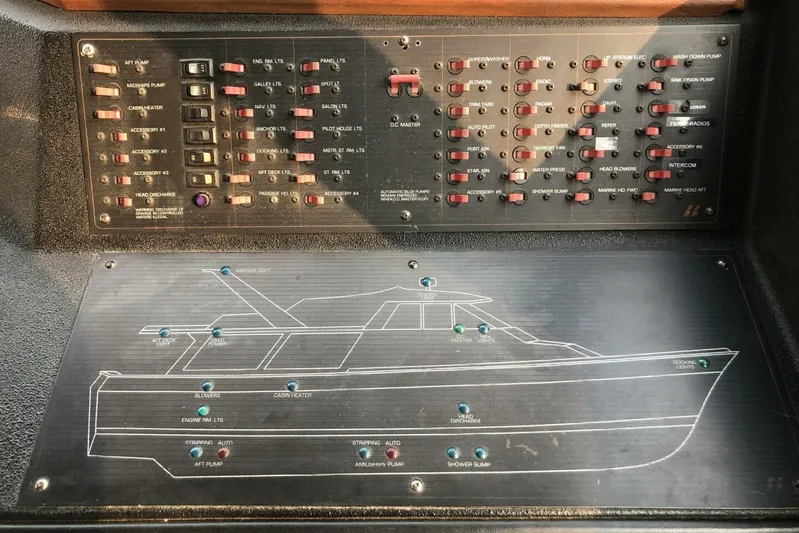  Yacht Photos Pics Control panel of a 1985 Bayliner 4550 Motoryacht with labeled switches and diagram.