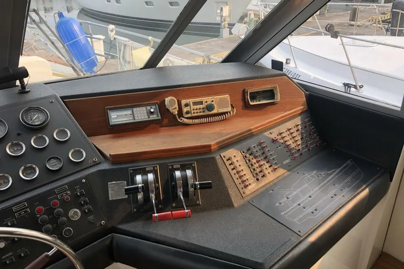  Yacht Photos Pics Control panel of a 1985 Bayliner 4550 Motoryacht with gauges and navigation equipment.