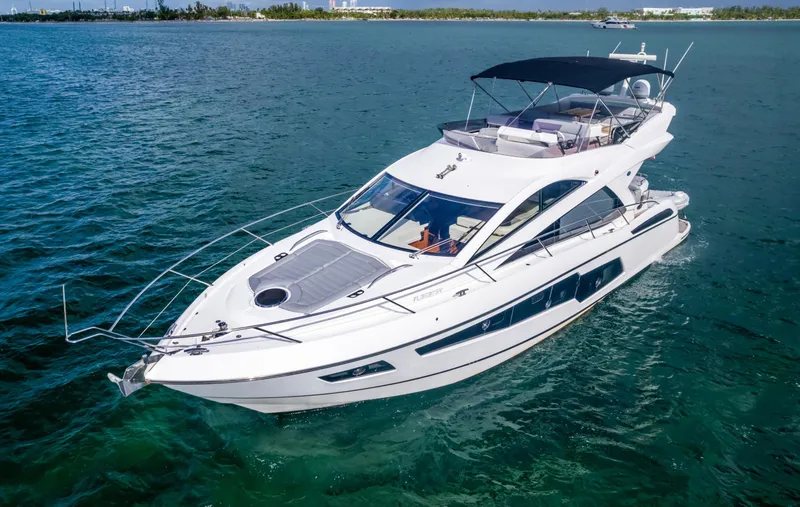 Ohana Yacht Photos Pics 2016 Sunseeker Manhattan 55 yacht cruising on open water.