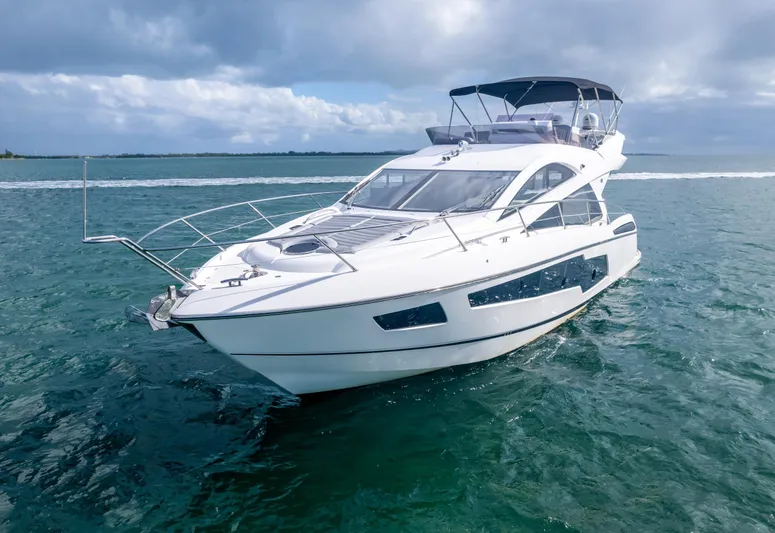 Ohana Yacht Photos Pics Luxury Sunseeker Manhattan 55 yacht cruising on open water, 2016 model.