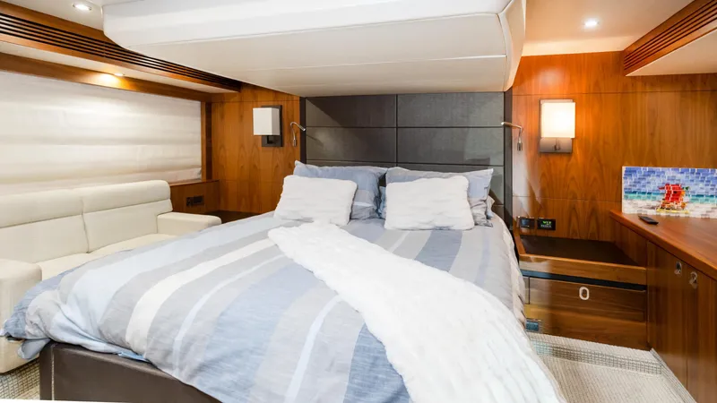 Ohana Yacht Photos Pics Luxurious bedroom interior of 2016 Sunseeker Manhattan 55 yacht with modern design.