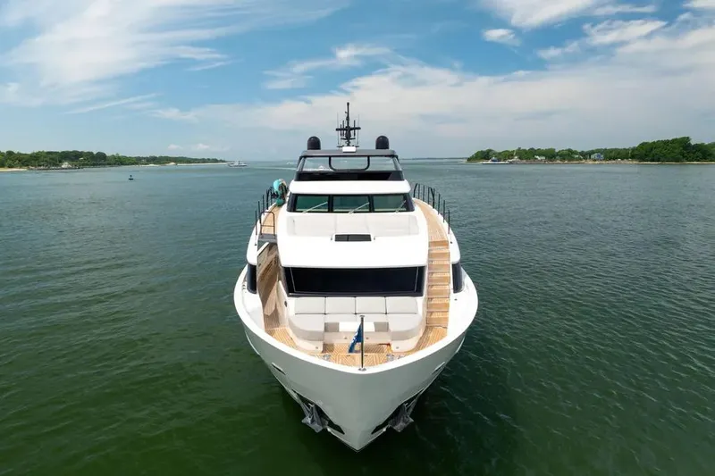 Sl90a Yacht Photos Pics 2024 Sanlorenzo SL90A yacht on calm water under blue sky.