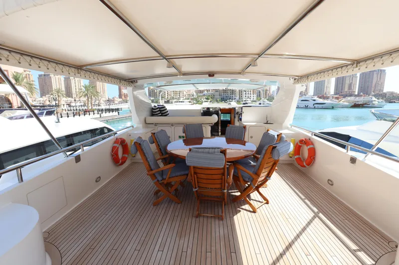  Yacht Photos Pics Luxurious Codecasa 105 Custom yacht deck with seating, overlooking marina, built in 1999.