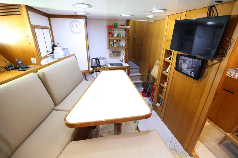  Yacht Photos Pics Interior of 1999 Codecasa 105 Custom yacht with cozy seating and modern amenities.